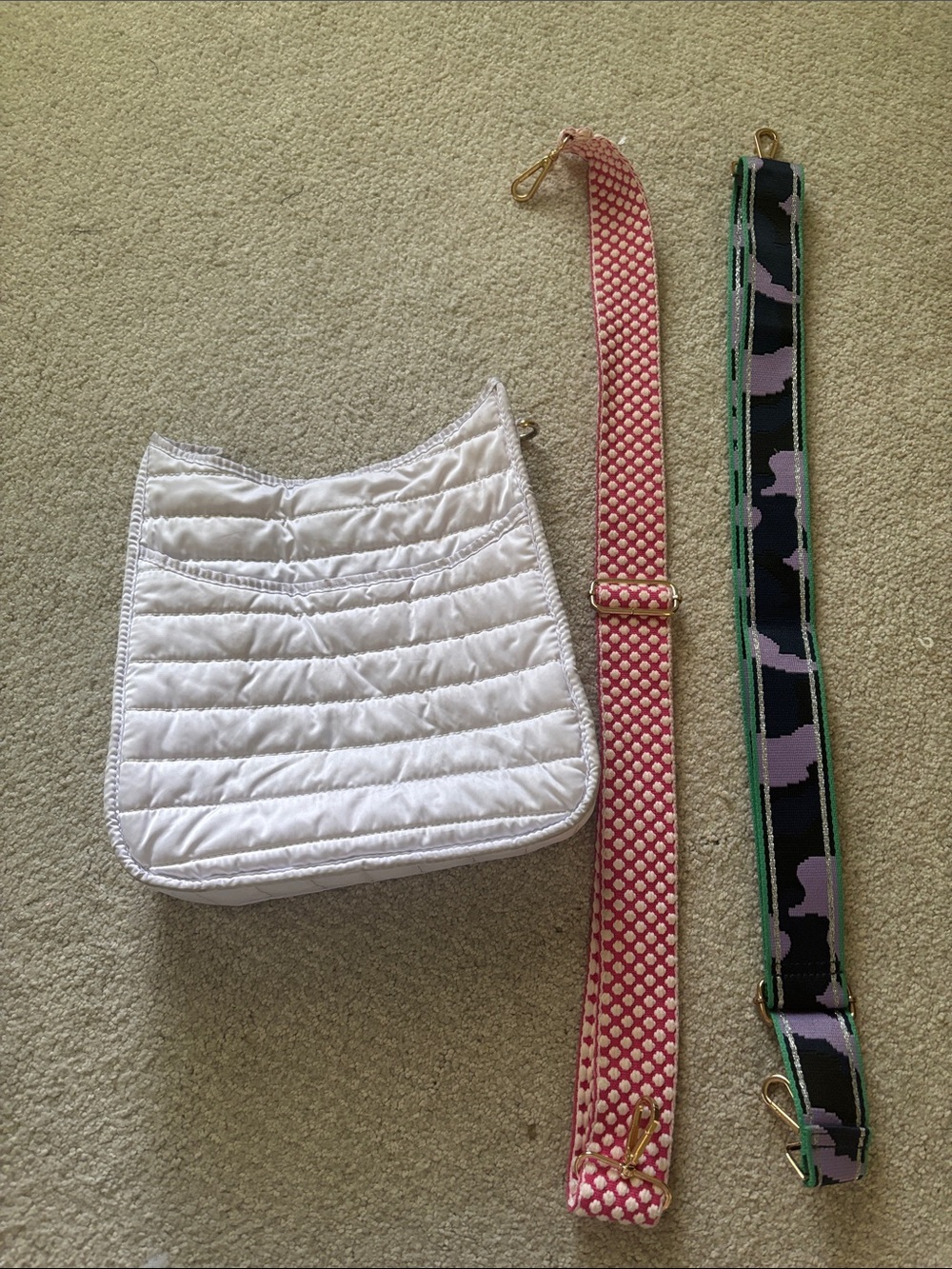 Adhorned white nylon bag ( washable) and two guitar straps. 
Priced for all